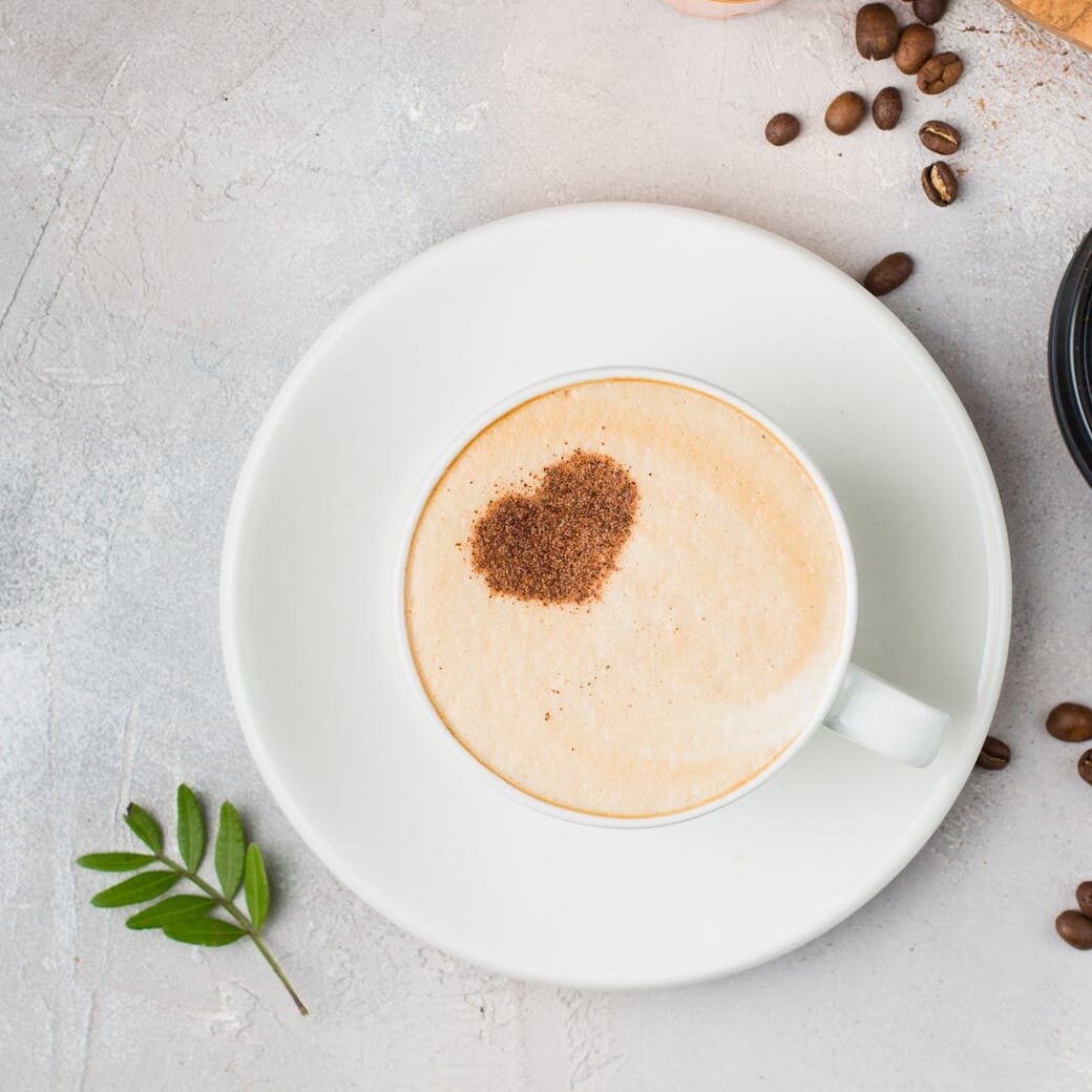 round white ceramic saucer and coffee cup